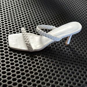 White braided high-heeled sandals with open-toe design and thin stiletto heel
